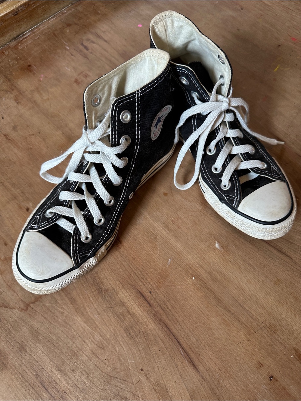 Converse women’s Black and White High-Top Sneakers